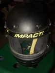 Impact Champ Racing Black Helmet, Medium Size Used.. Price: $320.00.